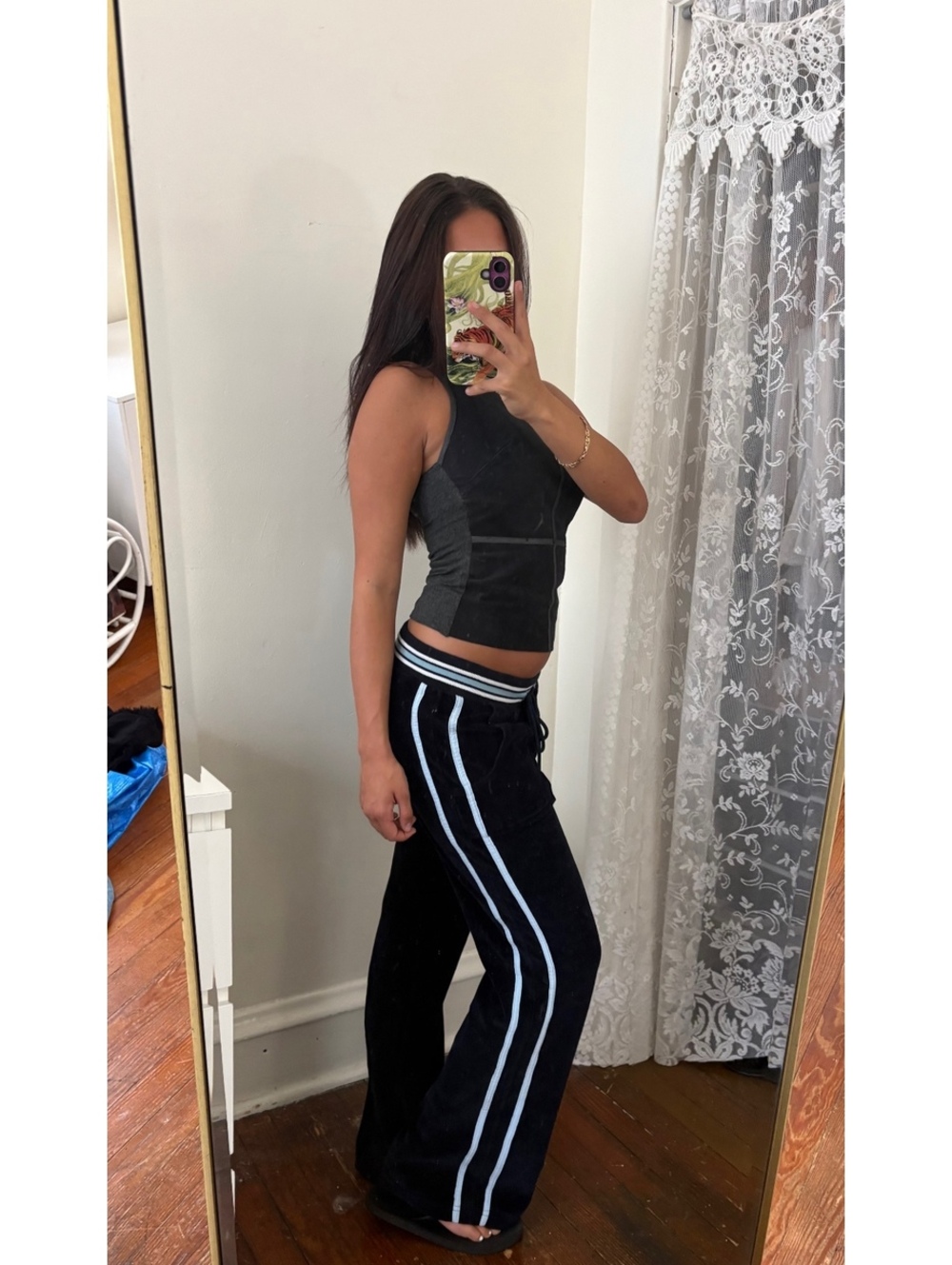 vintage 2000s Y2K navy velour track pants with white side stripes